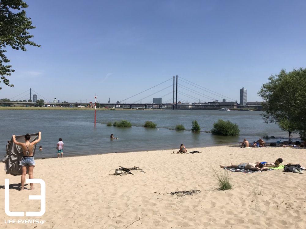 dusseldorf, ντισελντορφ, ρήνος, γερμανία, παραλία, μπάνιο, καύσωνας, γερμανοι, αμμουδιά, ποταμι Γερμανία κορονοϊός